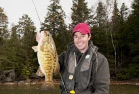 Tim Allard with a smallmouth finessed into biting a custom bucktail jig. 