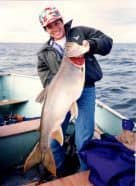 ‘Bobber’ Anne Orth with a giant lake trout that gobbled up the quick-strike rig baited with the head of a smaller laker. They trolled slowly, presenting the bait behind a 10-ounce Bait Walker sinker.