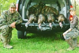 Keck with his daughter and trophy gobblers in S.C.