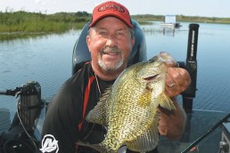Guide Tom Neustrom with a monster crappie