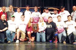 High School team poses for fishing team awards.
