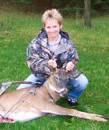 Lisa’s first-ever deer with her bow was a nice ‘forked’ buck she arrowed from a treestand behind her house.