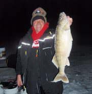 Mark Brumbaugh set the hook in this dandy walleye with Berkley FireLine braid. Photo: John Bennett