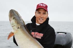 Jim Saric with a big fall muskie caught trolling the edge of a reef.