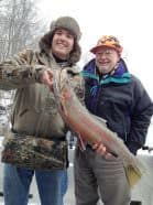 Happy clients on the St. Joseph River fishing with Seahawk Charters.