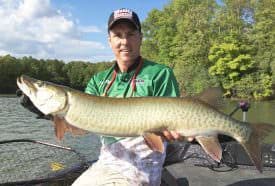 Jim Saric with an early-season muskie from a protected area that had warmed during the afternoon.