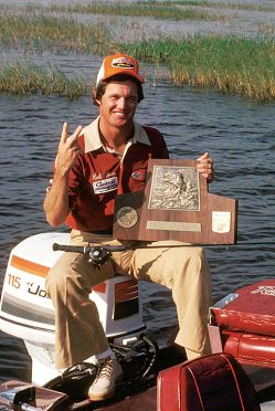 Pro fisherman Rick Clunn with his trophy plaque from winning his second conssecutive Bassmaster Classic